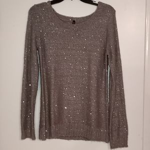 Women's sweater with sequence